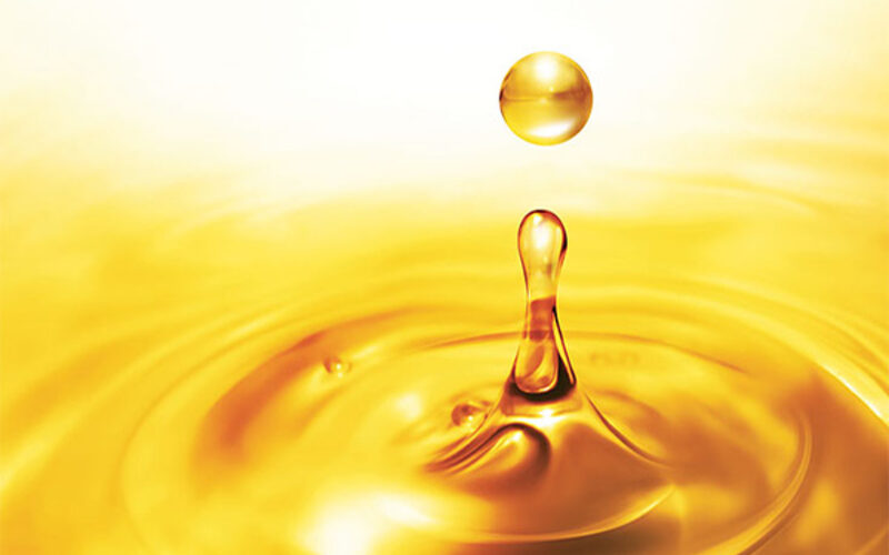 Golden oil droplet and ripples