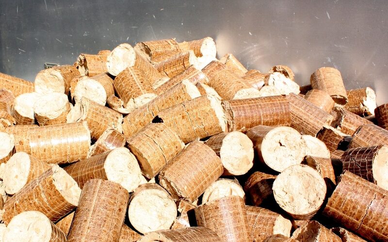 Pile of pressed biomass briquettes