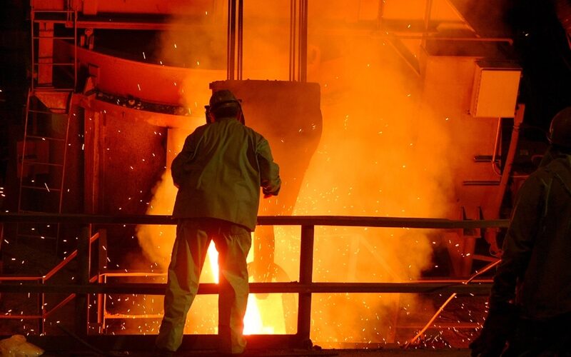 Molten metal being poured at a foundry